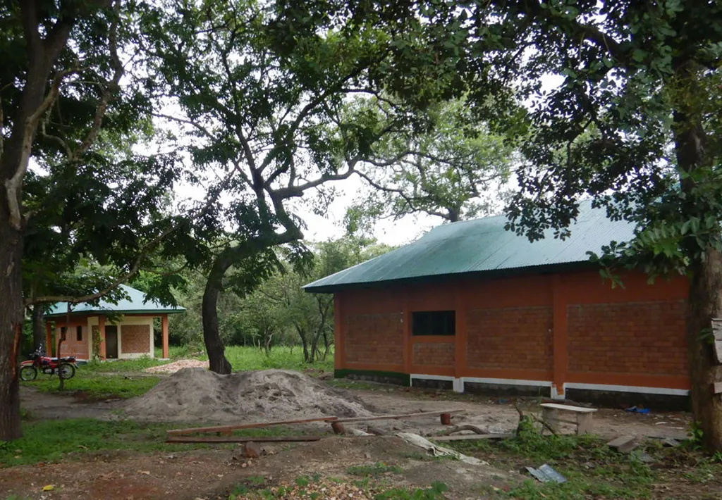 Dormitories among the trees at Camp Dungu