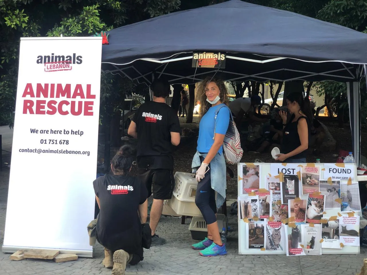Animals Lebanon rescue tent with volunteers and lost-and-found posters